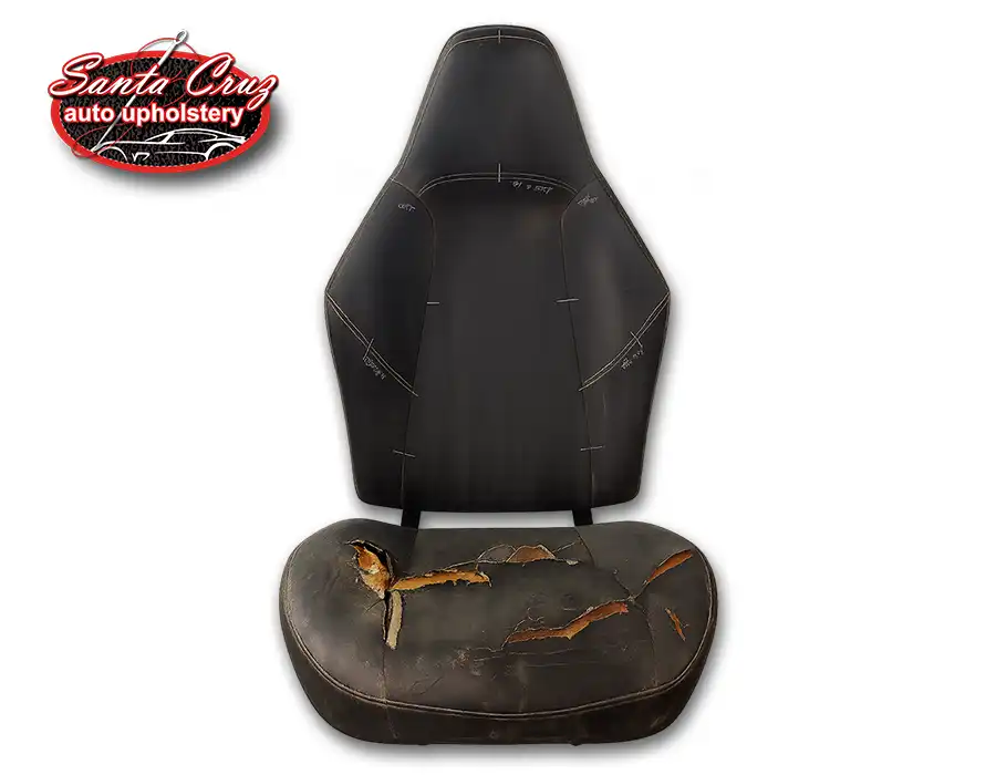 Worn Polaris RZR seat with torn vinyl before custom reupholstery by a Phoenix family-owned upholstery shop.